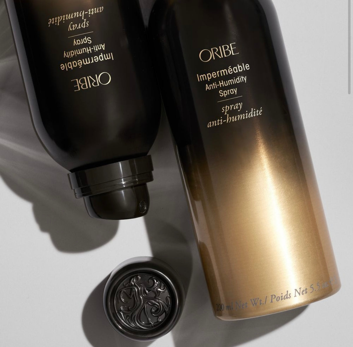 Oribe Imperméable — спрей-антифриз для захисту від вологи та пухнастості волосся