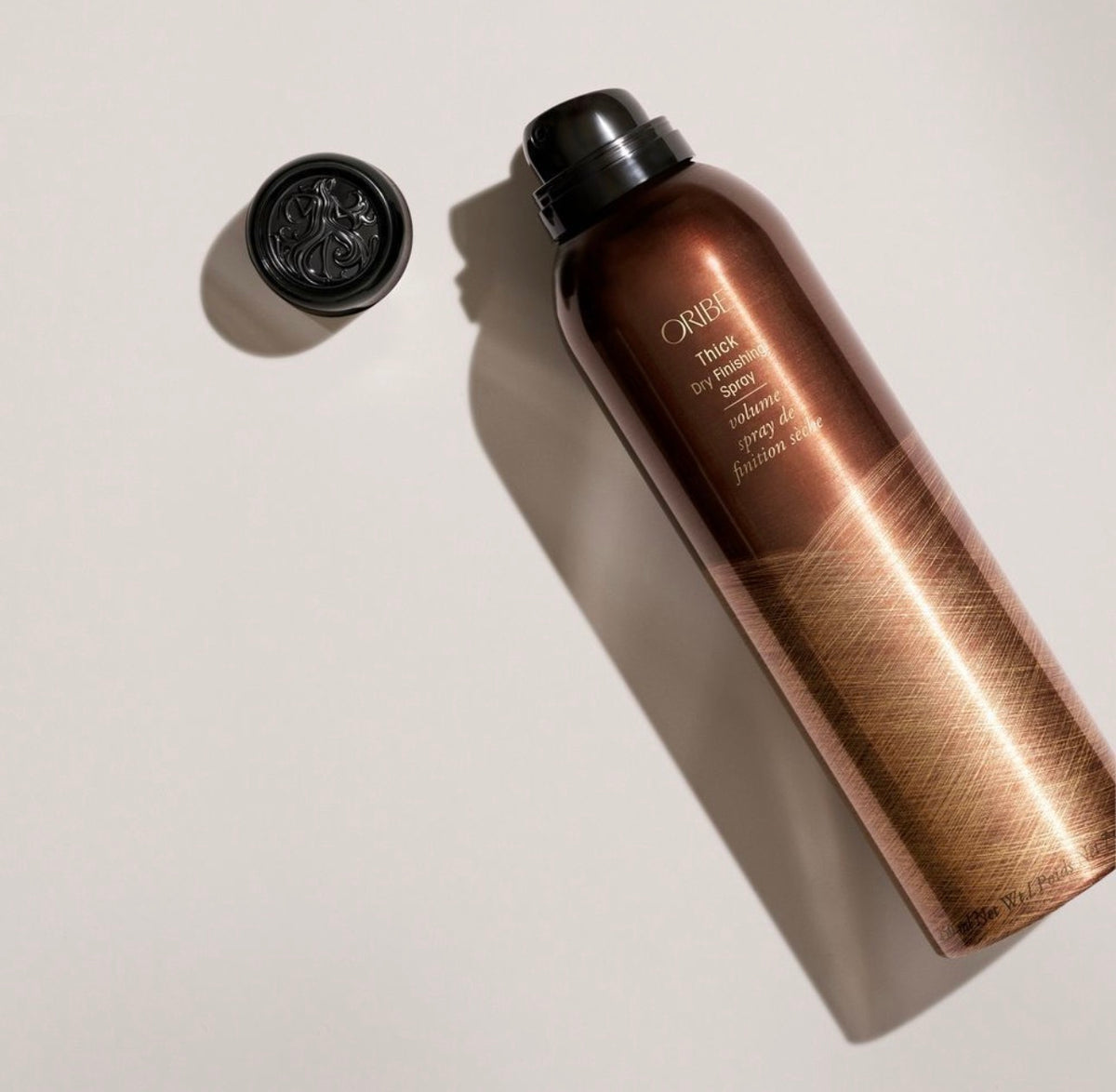 Oribe Thick Dry Finishing Spray — сухий спрей для розкішного об’єму та густоти волосся